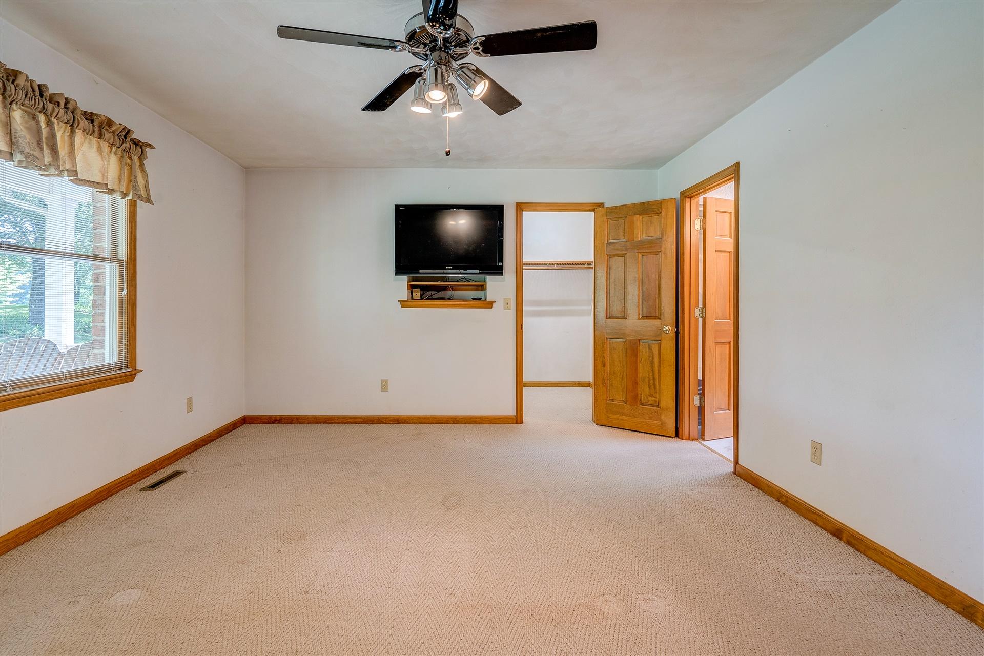 414 Thompson Ridge Circle Ferrum, VA 24088 - Photo 22 of 33 a view of a livingroom with a flat screen tv