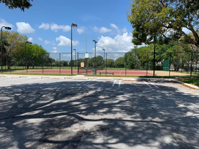 a view of a swimming pool with an outdoor space and seating