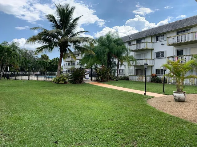 a view of hallway with windows