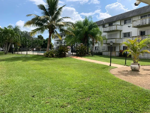 a view of a park with a slide