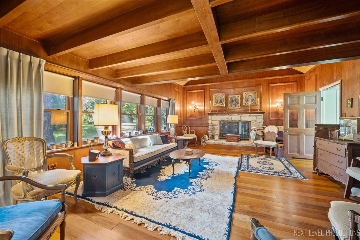 7N384 Whispering Willows Street St. Charles, IL 60174 - Photo 11 of 48 a living room with patio furniture and a large window