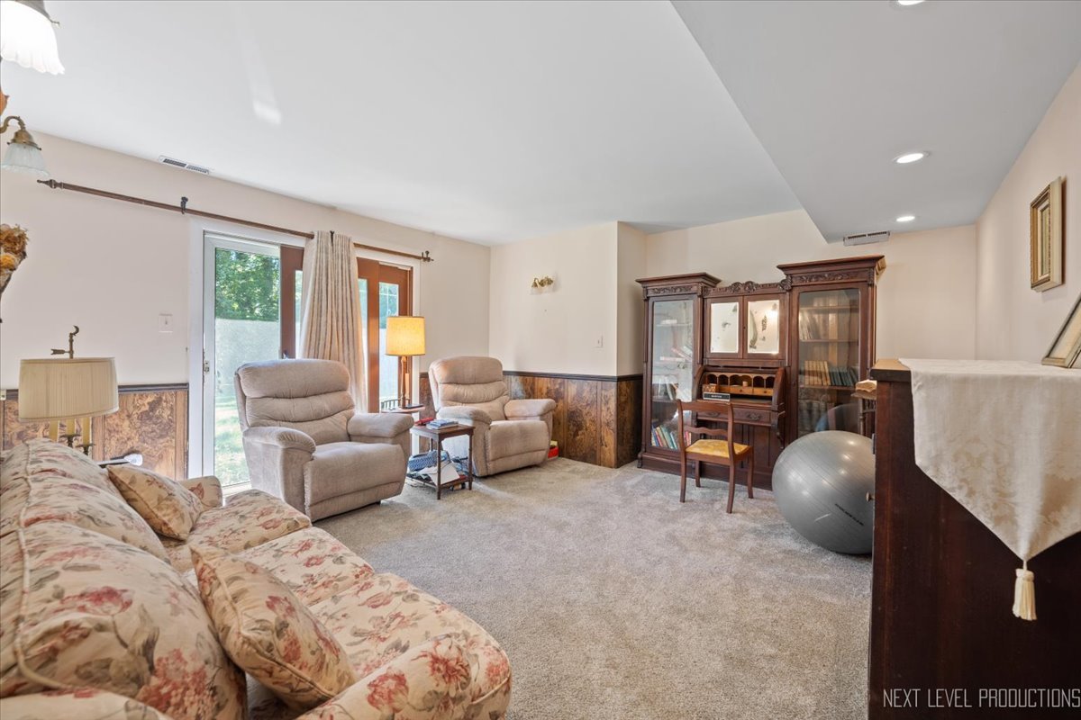 7N384 Whispering Willows Street St. Charles, IL 60174 - Photo 19 of 48 a bedroom with furniture and a large window