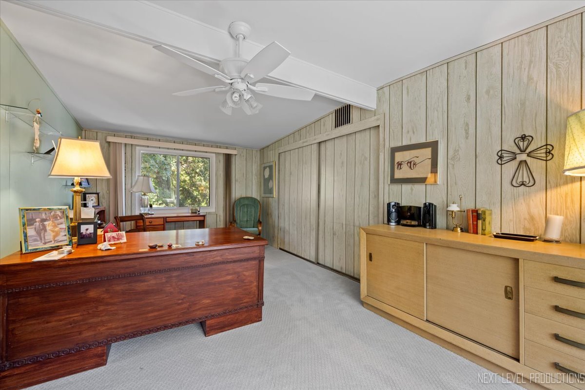 7N384 Whispering Willows Street St. Charles, IL 60174 - Photo 21 of 48 a room with a bed and a chandelier