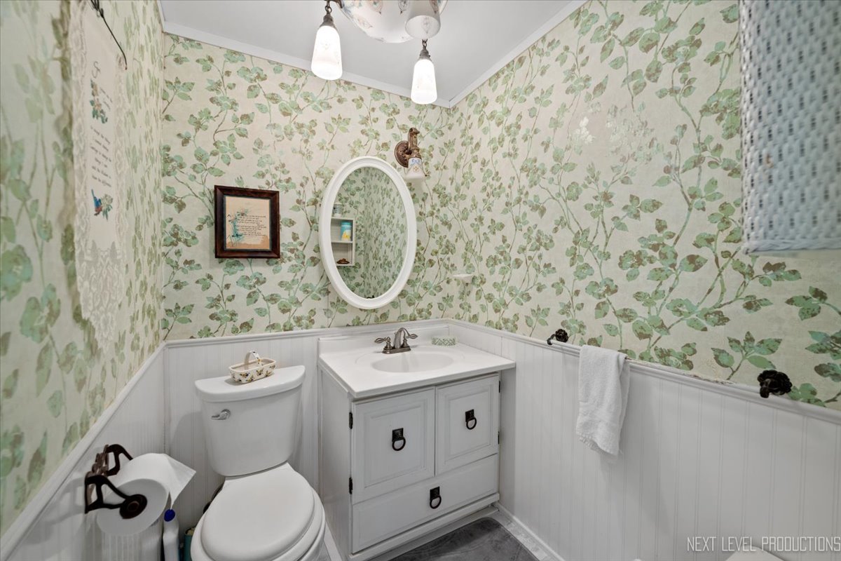 7N384 Whispering Willows Street St. Charles, IL 60174 - Photo 24 of 48 a bathroom with a sink and a mirror