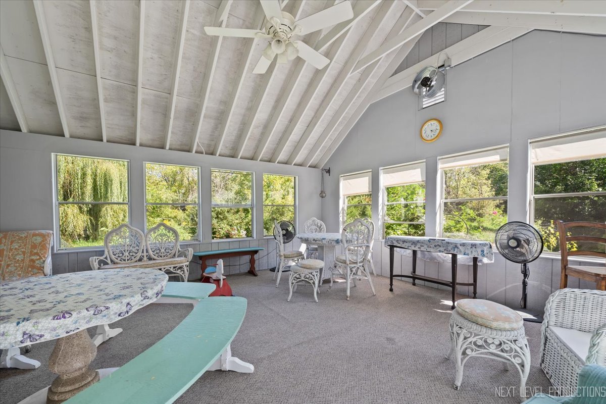 7N384 Whispering Willows Street St. Charles, IL 60174 - Photo 25 of 48 a living room with furniture and large windows