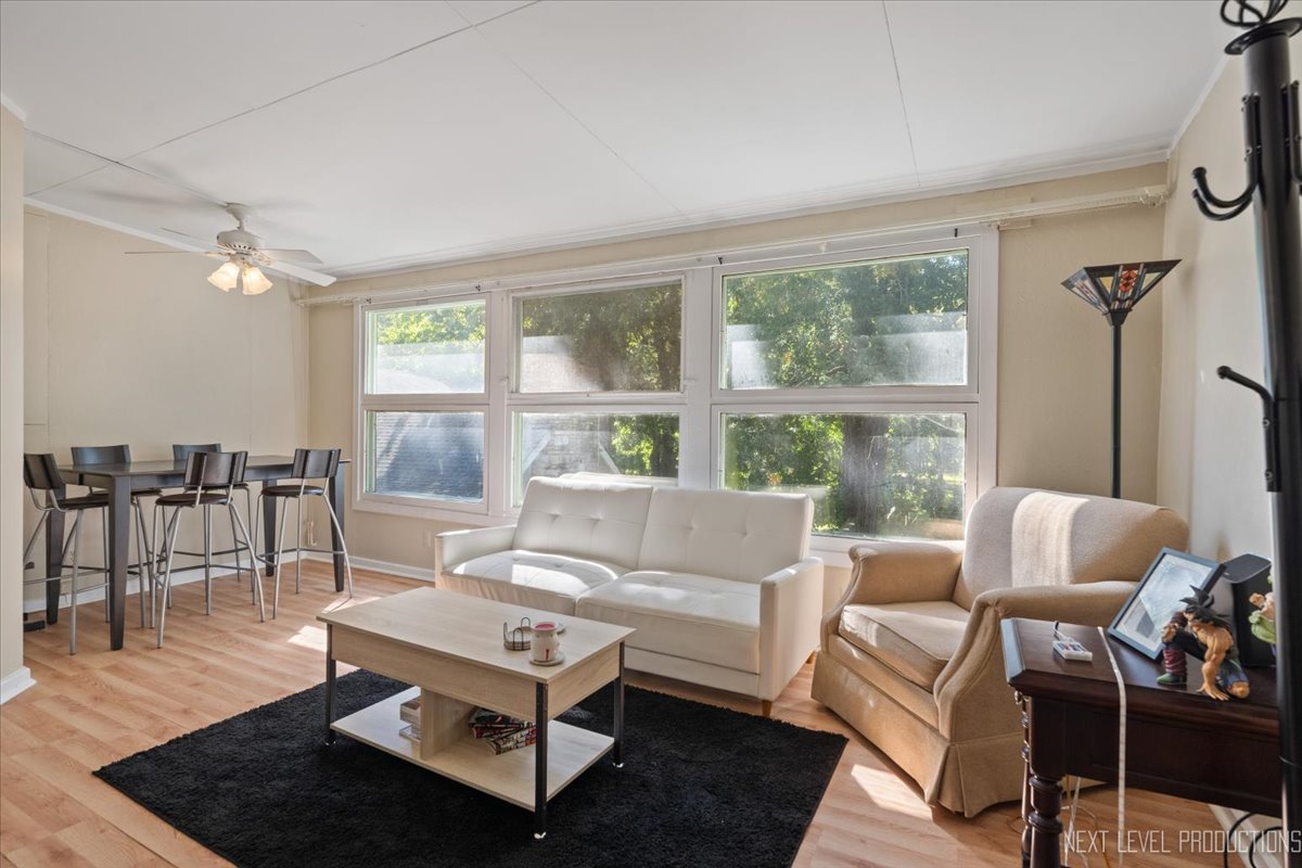 7N384 Whispering Willows Street St. Charles, IL 60174 - Photo 28 of 48 a living room with furniture and a large window