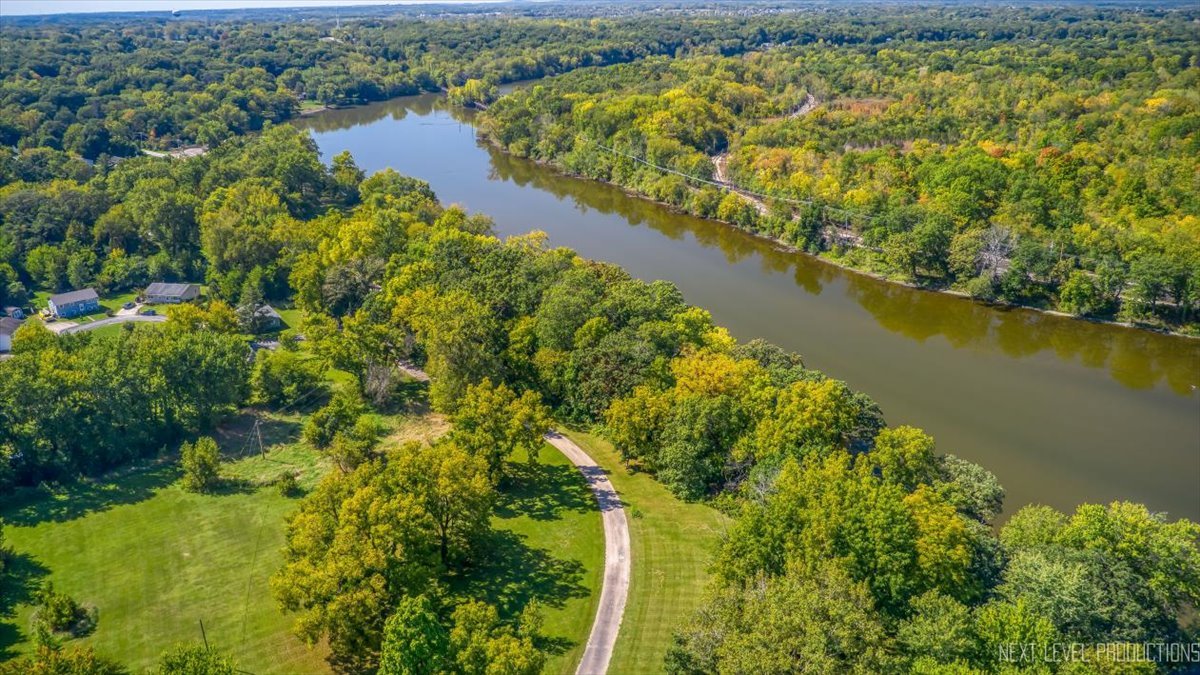 7N384 Whispering Willows Street St. Charles, IL 60174 - Photo 3 of 48 a view of a lake with a city view