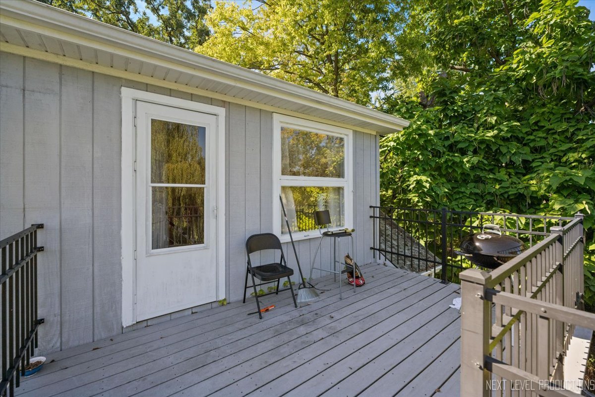 7N384 Whispering Willows Street St. Charles, IL 60174 - Photo 34 of 48 a view of house with deck and outdoor seating
