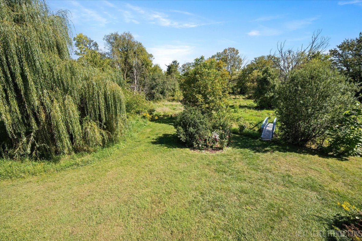 7N384 Whispering Willows Street St. Charles, IL 60174 - Photo 35 of 48 a street view with large trees