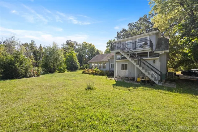 a house with a yard in front of it