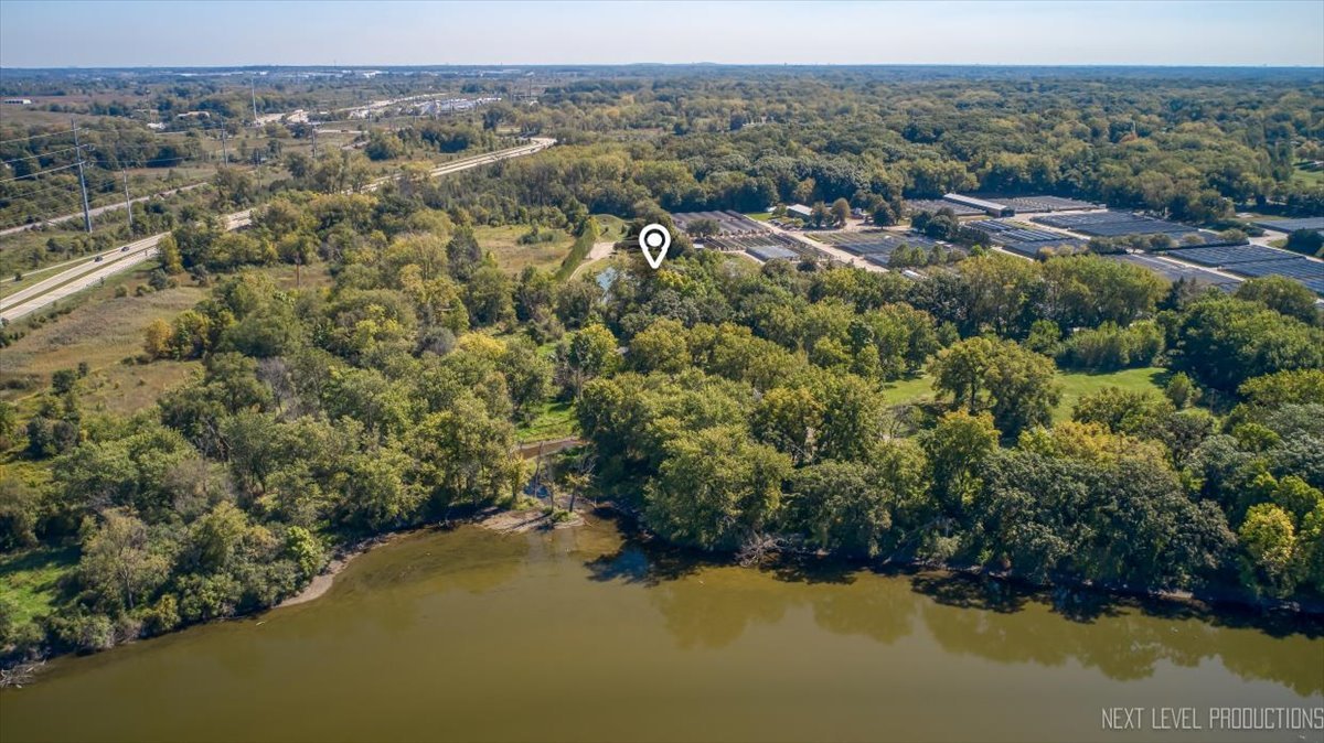 7N384 Whispering Willows Street St. Charles, IL 60174 - Photo 40 of 48 an aerial view of a houses with a lake view