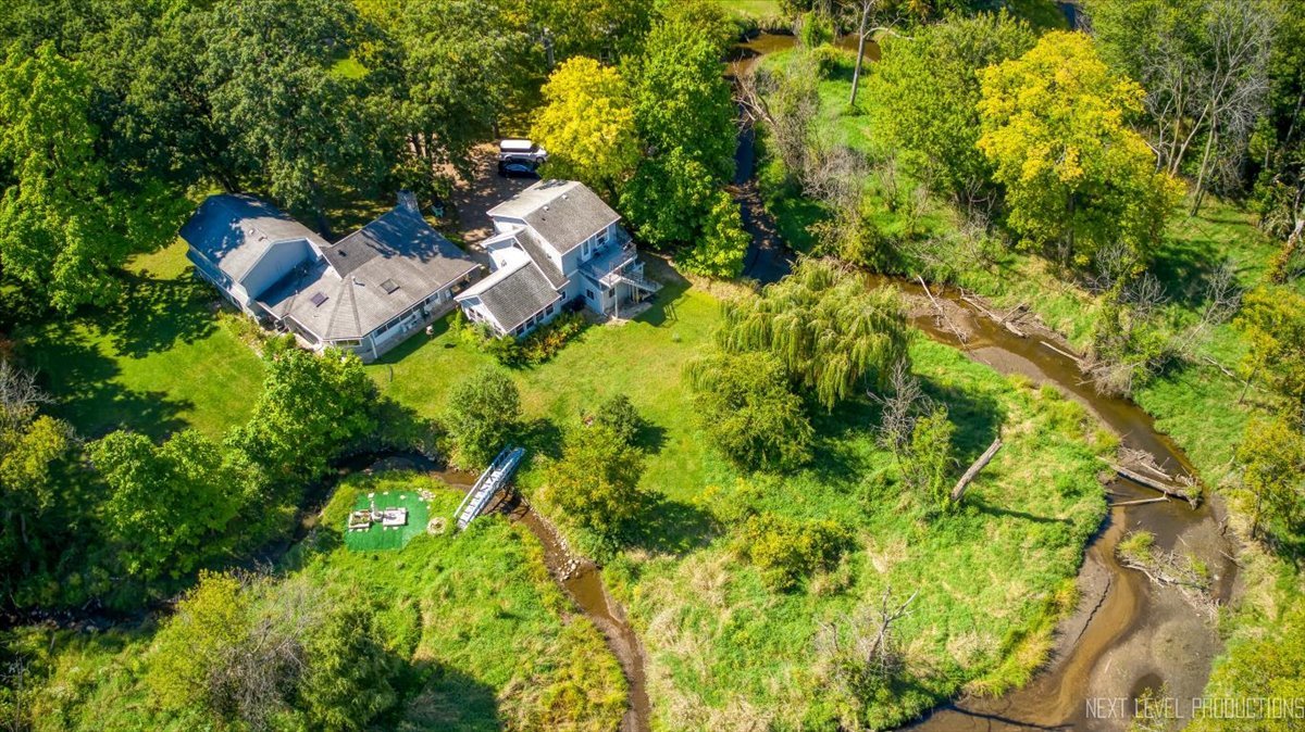 7N384 Whispering Willows Street St. Charles, IL 60174 - Photo 43 of 48 an aerial view of residential house with outdoor space and trees all around