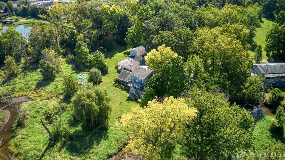 7N384 Whispering Willows Street St. Charles, IL 60174 - Photo 5 of 48 a bunch of trees and bushes