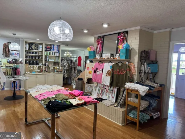 a room with furniture toys and a window