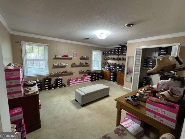 a bedroom with furniture