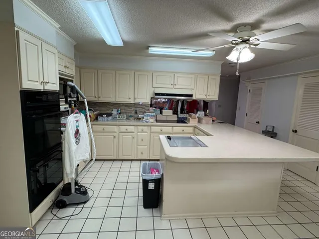 a bedroom with furniture and a bed