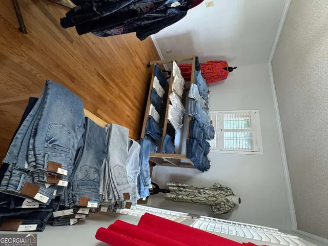a bathroom with a double vanity sink mirror and toilet
