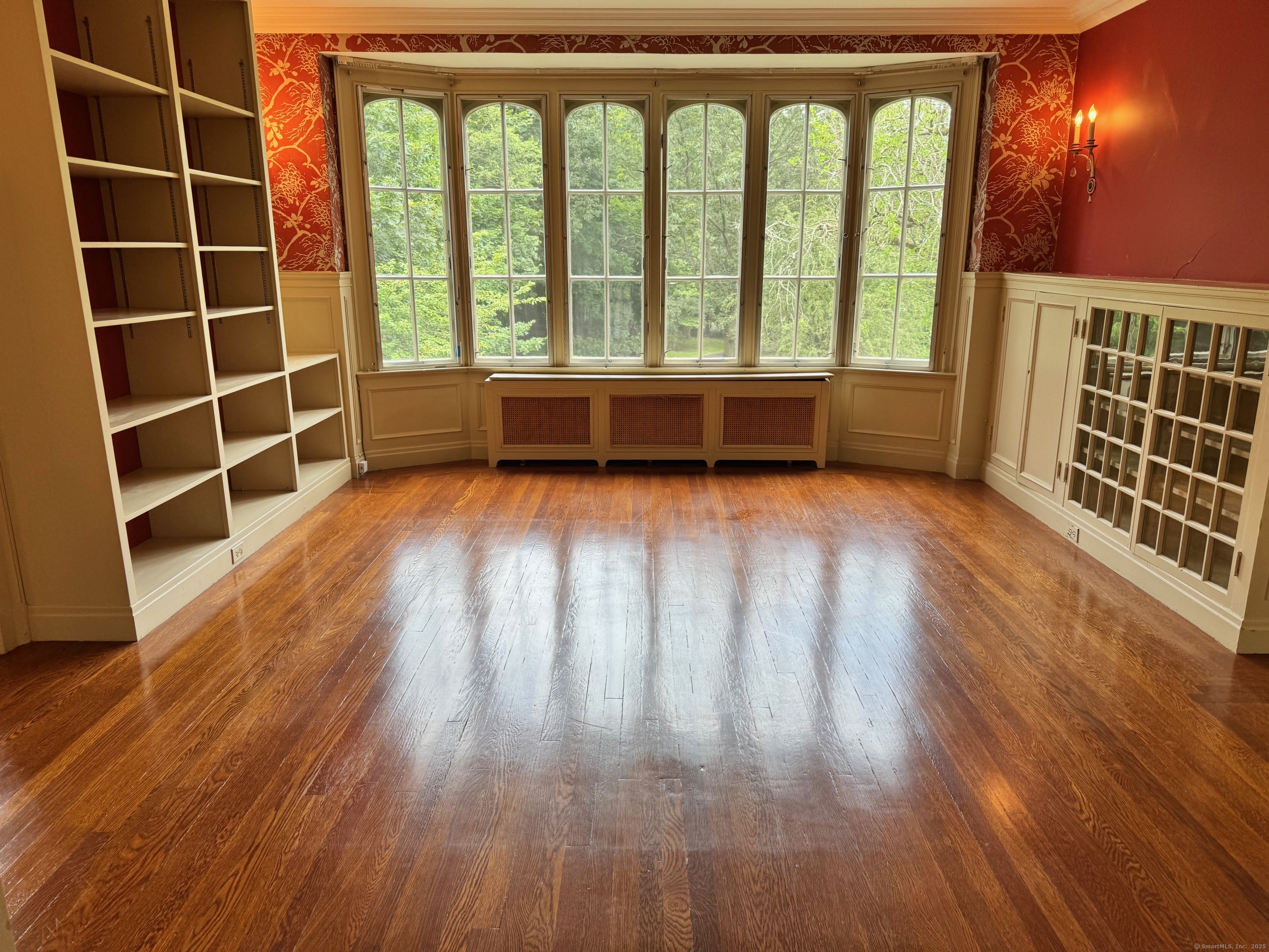 1056 Whitney Avenue Hamden, CT 06517 - Photo 28 of 40 wooden floor in an empty room with a window