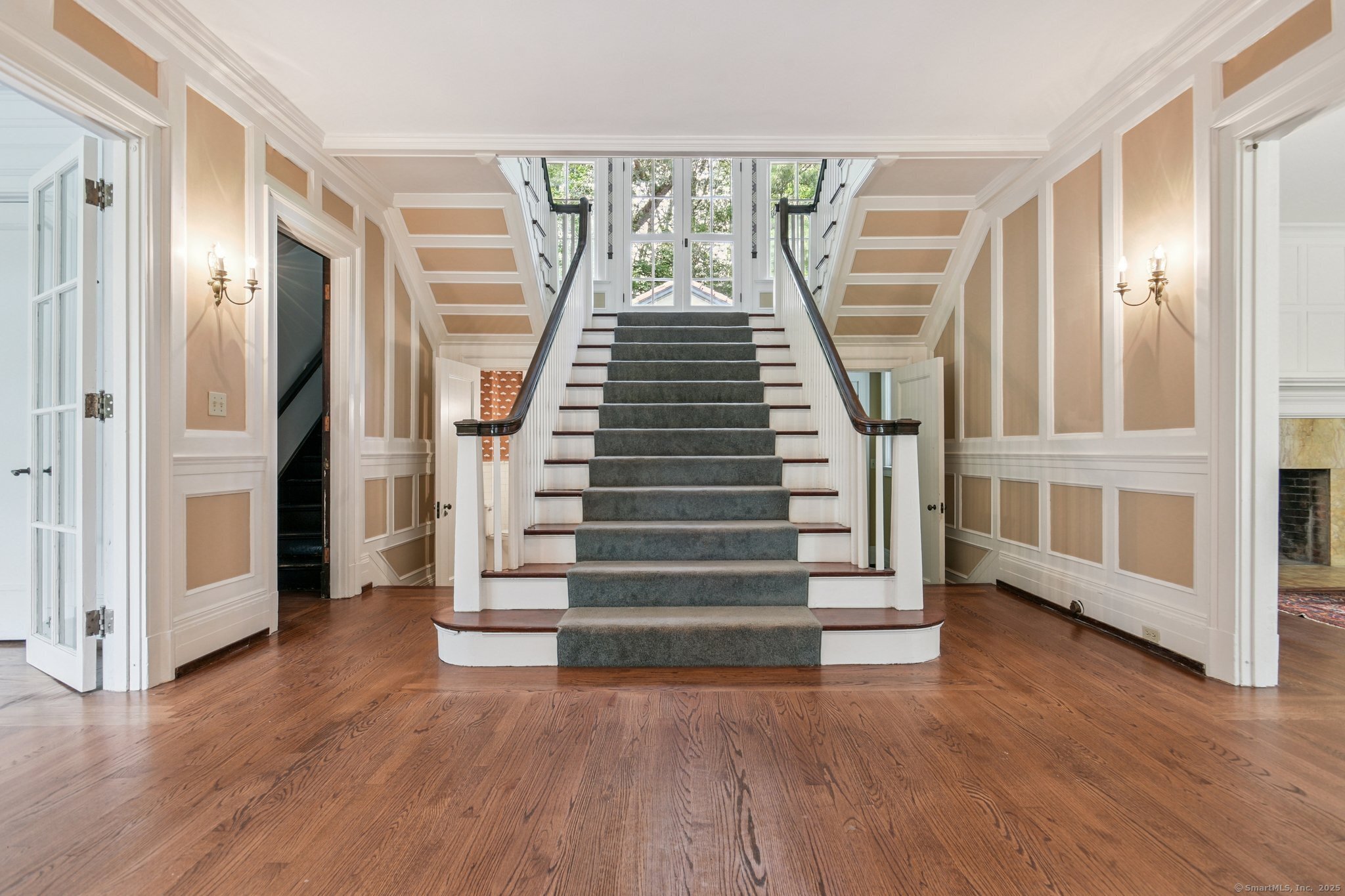 1056 Whitney Avenue Hamden, CT 06517 - Photo 4 of 40 a view of entryway with wooden floor and stairs
