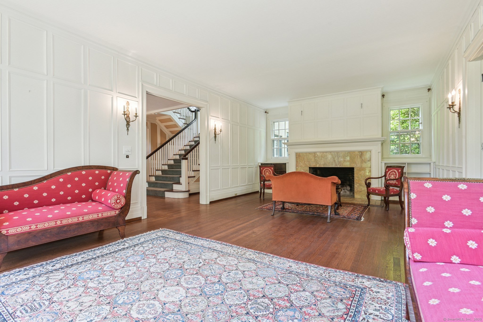1056 Whitney Avenue Hamden, CT 06517 - Photo 6 of 40 a living room with furniture and a fireplace