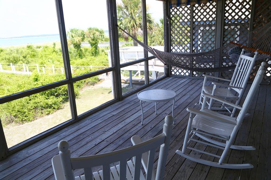 3530 Yacht Club Road Edisto Beach, SC 29438 - Photo 9 of 22 Screened porch
