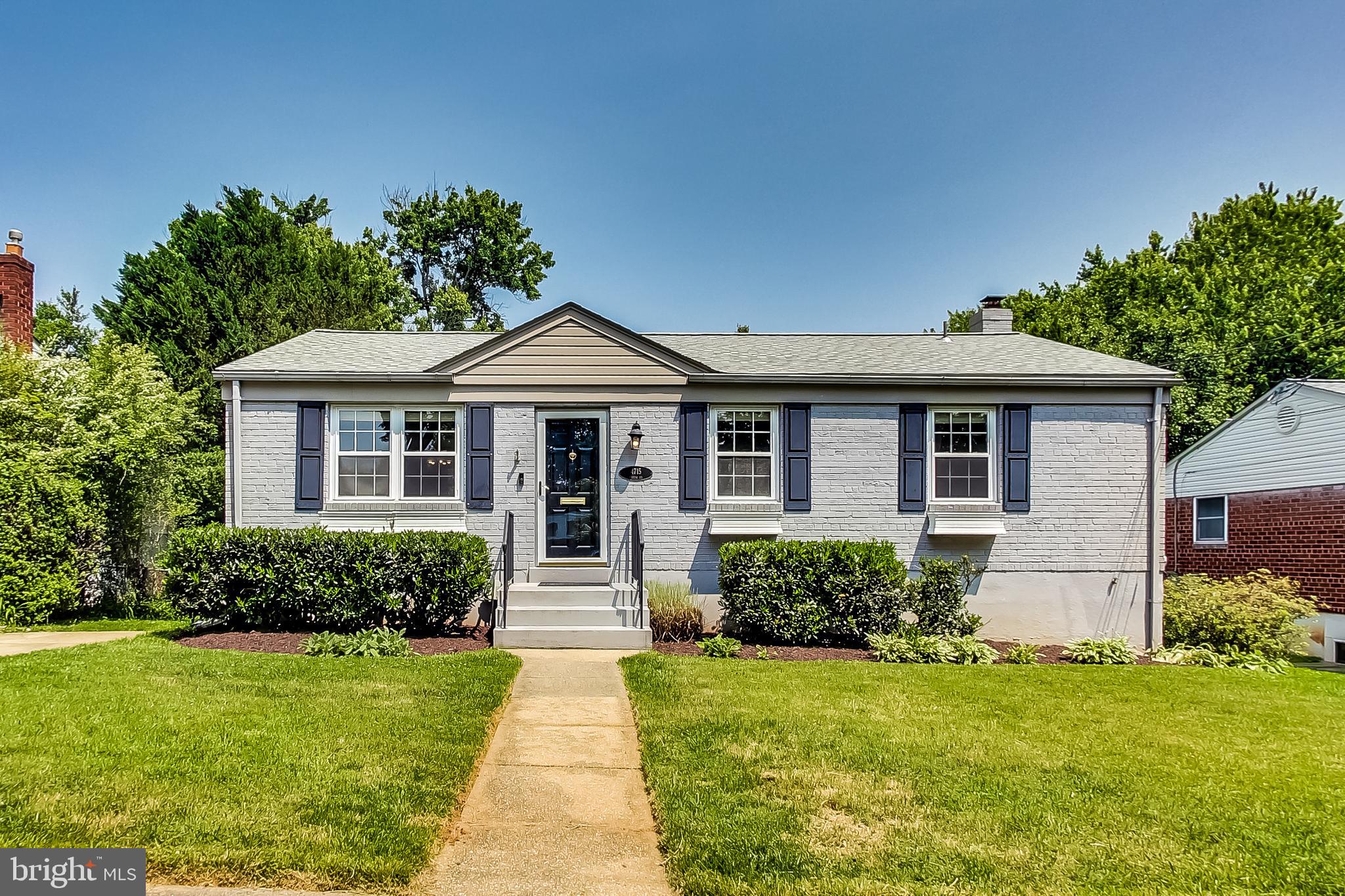 4715 Oxbow Road Rockville, MD 20852 - Photo 1 of 35 a front view of a house with a yard