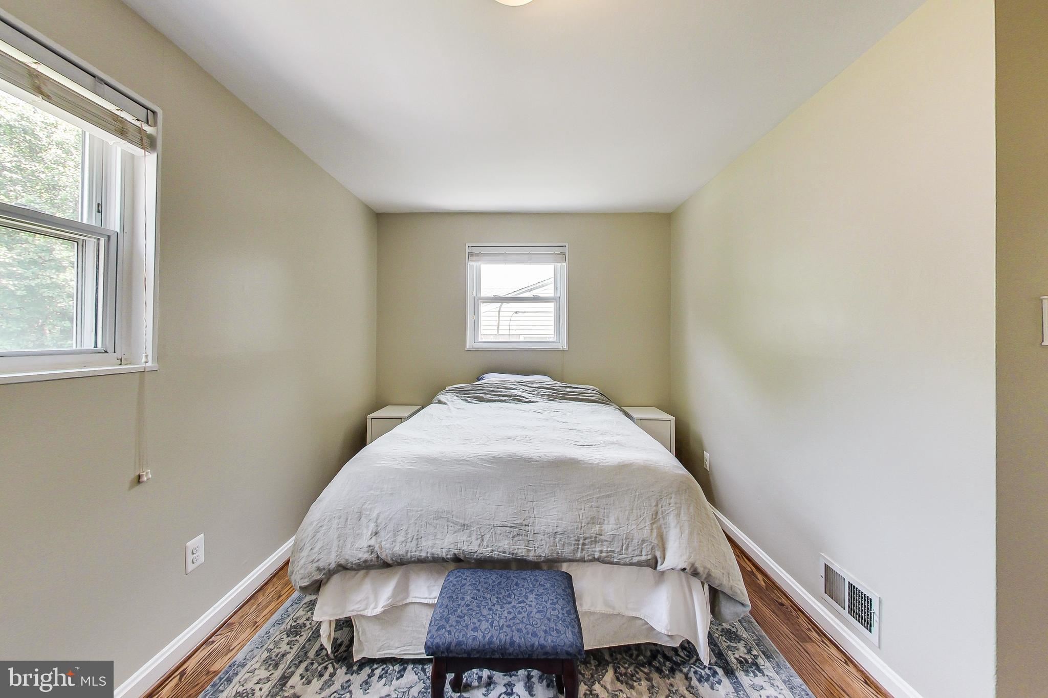 4715 Oxbow Road Rockville, MD 20852 - Photo 11 of 35 a bed room with a bed and a window