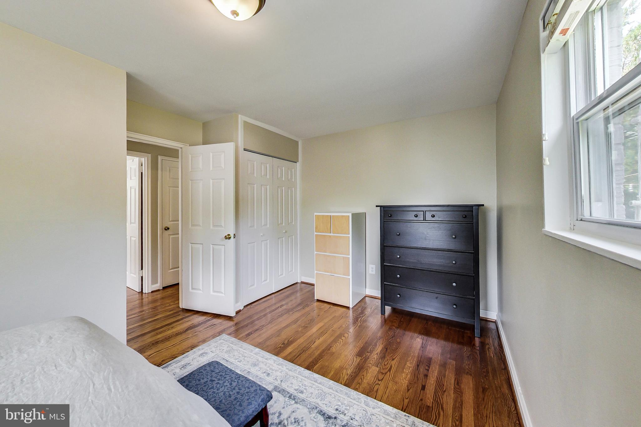 4715 Oxbow Road Rockville, MD 20852 - Photo 12 of 35 a bedroom with a bed and a window