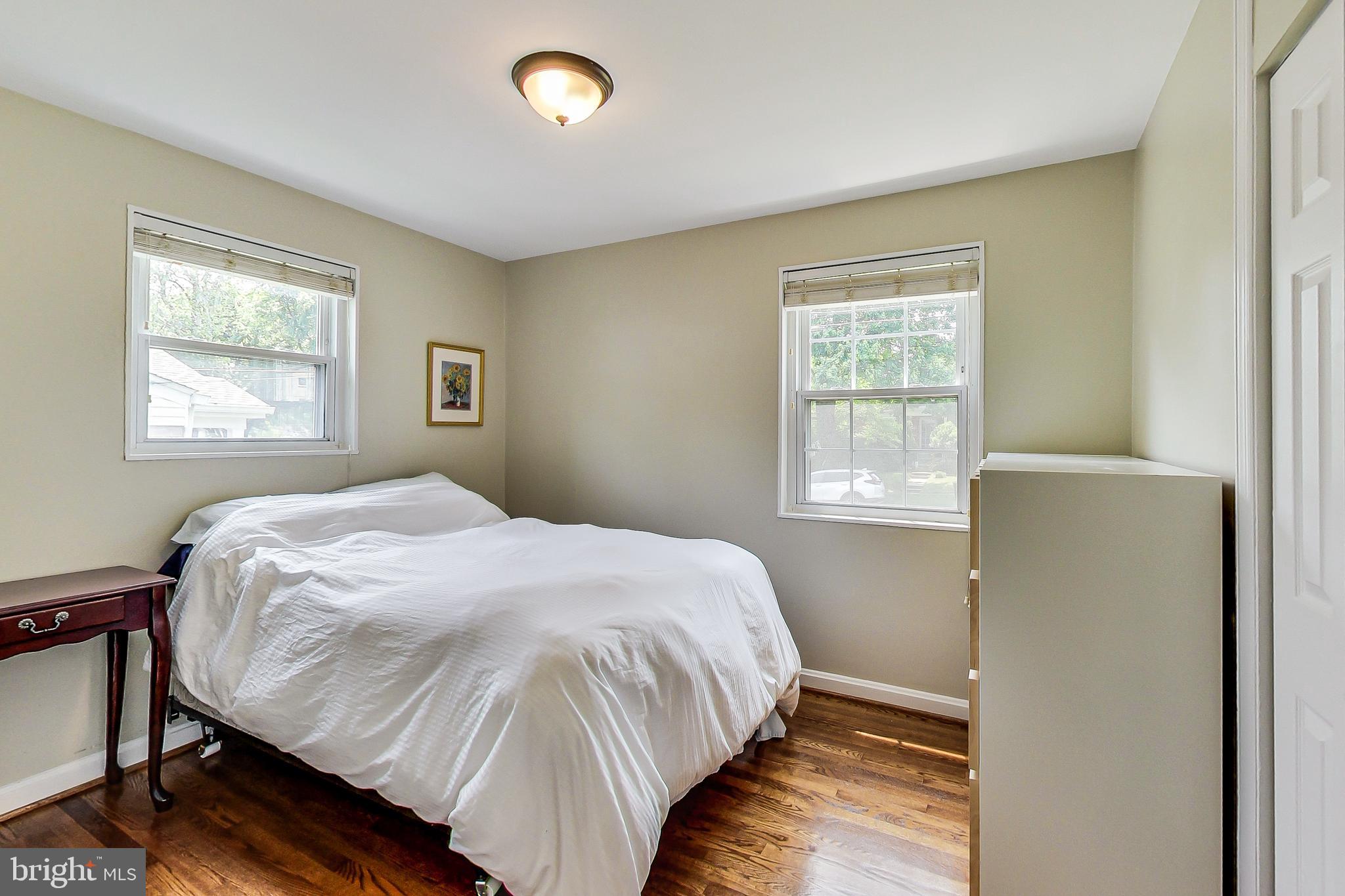 4715 Oxbow Road Rockville, MD 20852 - Photo 13 of 35 a bedroom with a bed and a window