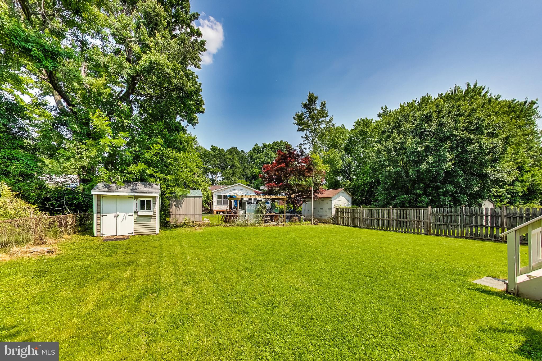 4715 Oxbow Road Rockville, MD 20852 - Photo 32 of 35 a view of a house with a big yard