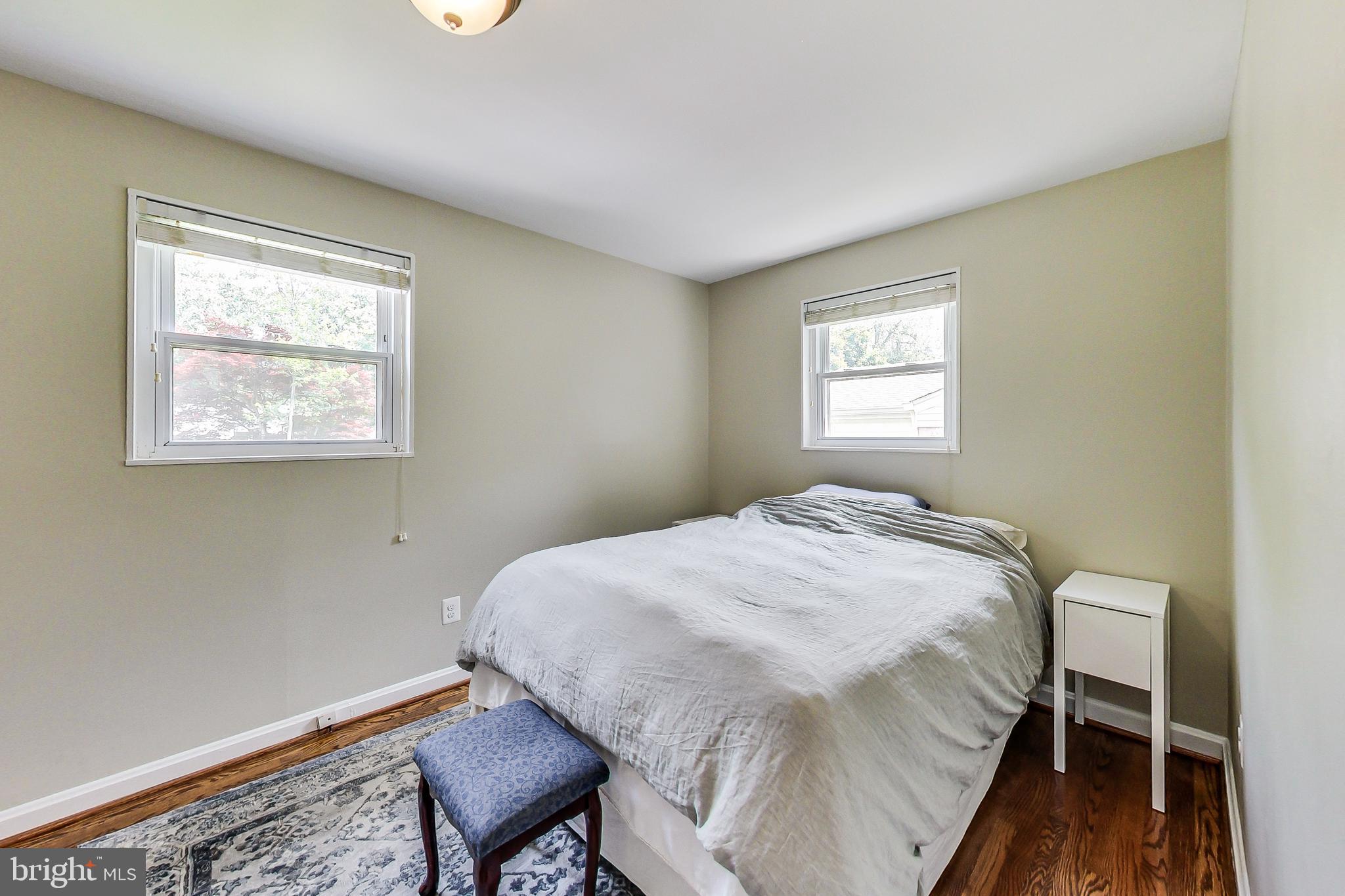 4715 Oxbow Road Rockville, MD 20852 - Photo 10 of 35 a bedroom with a bed and a window