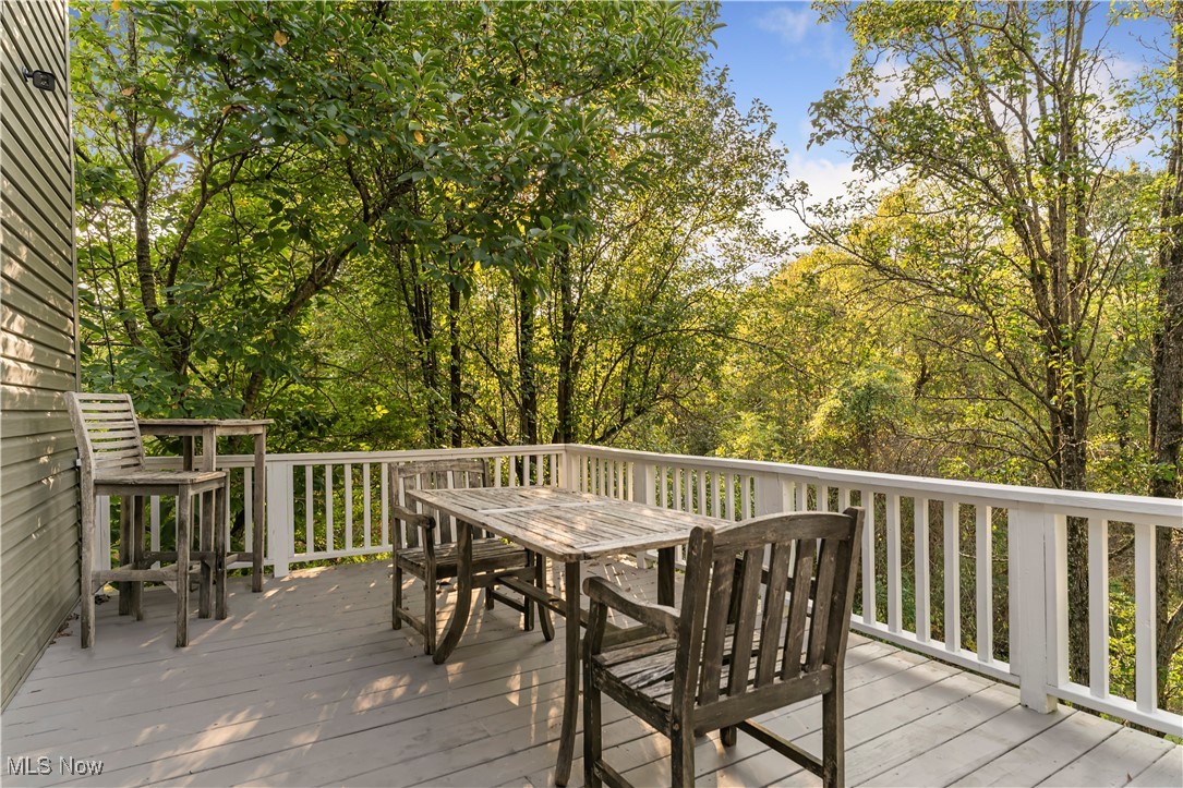 155 Ridgewood Boulevard Belpre, OH 45714 - Photo 33 of 49 Wooden terrace with outdoor dining area