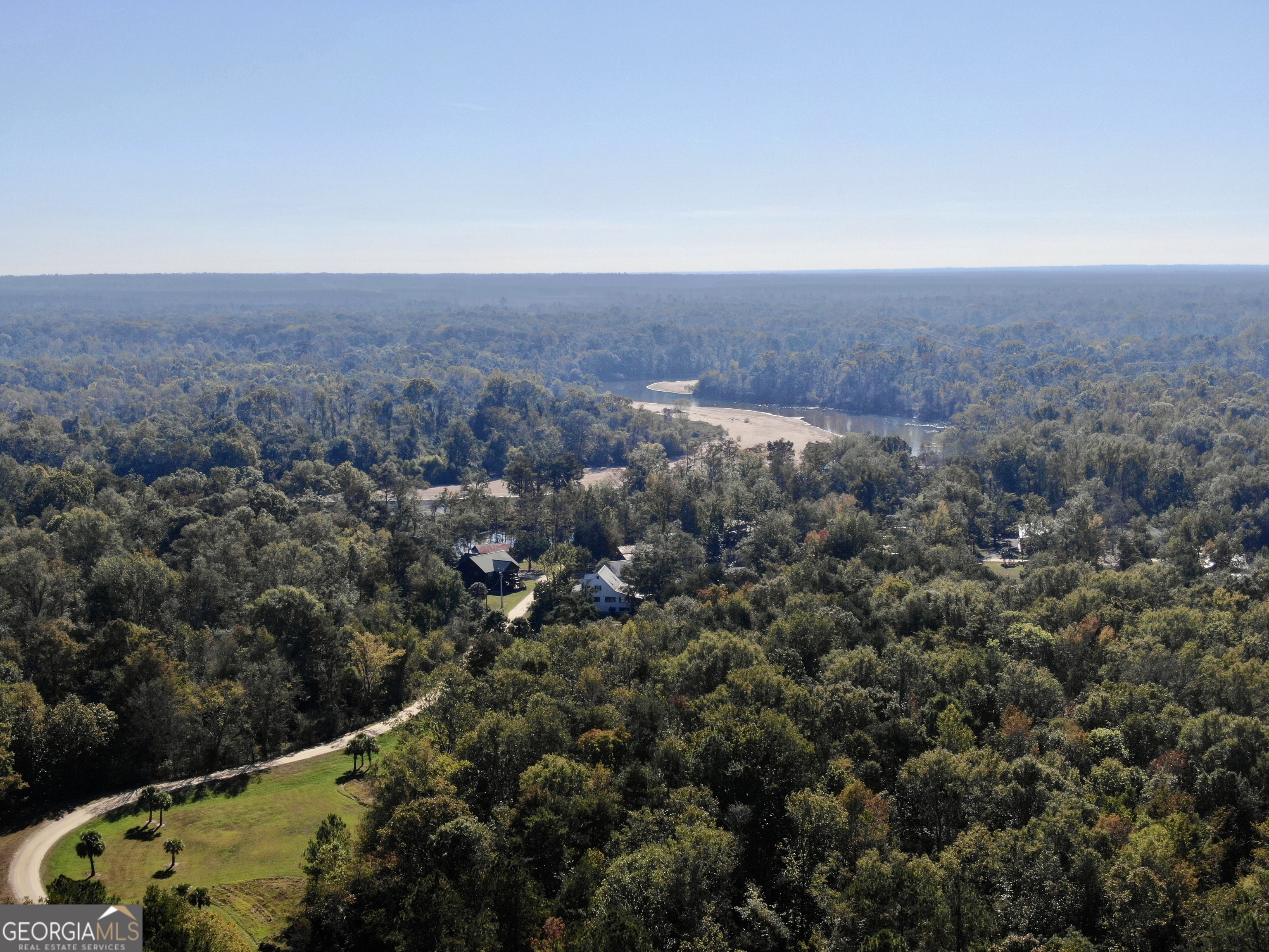 226 Cherokee Road Glenwood, GA 30428 - Photo 13 of 117 an aerial view of house with yard and mountain view in back