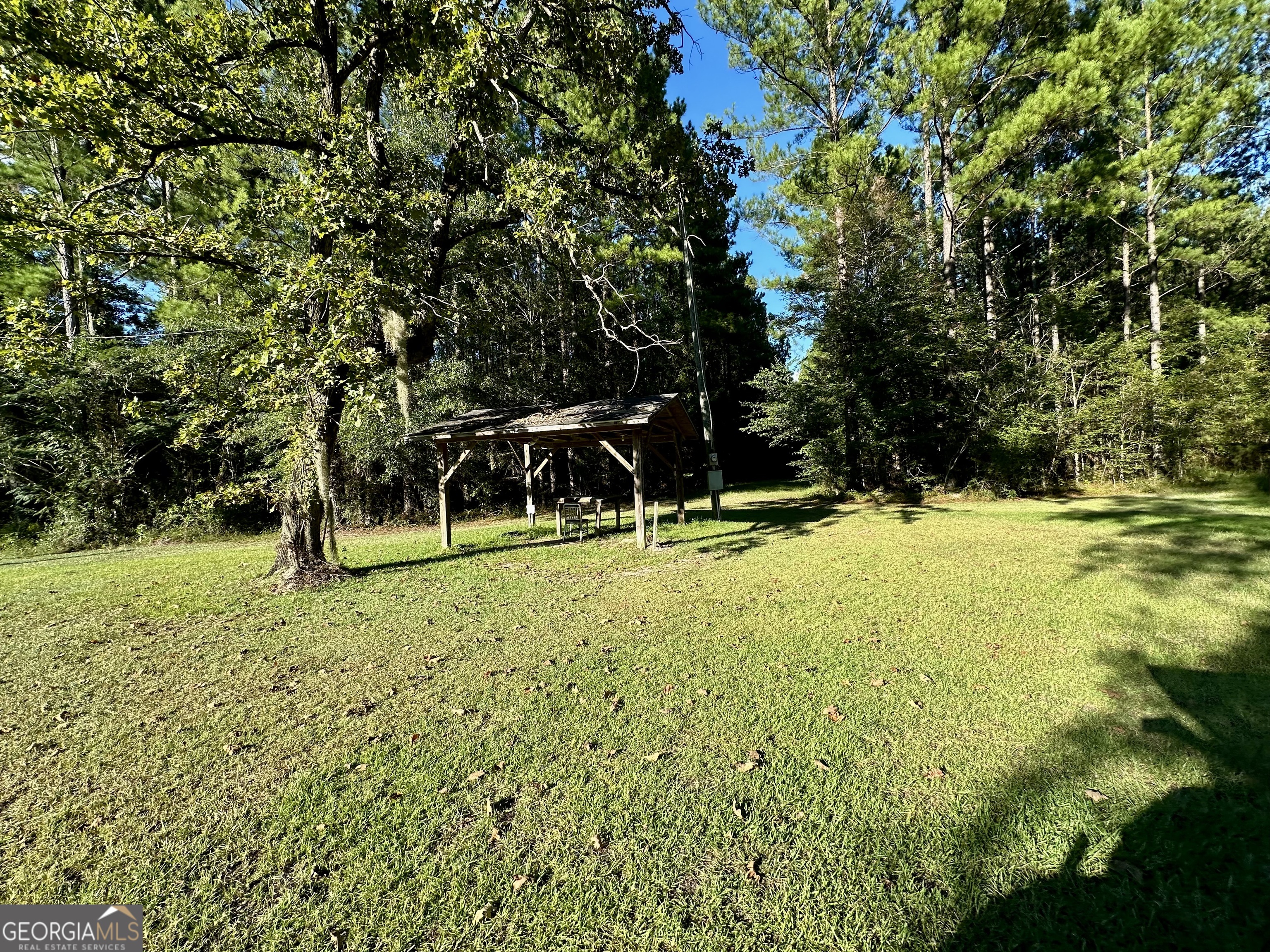 226 Cherokee Road Glenwood, GA 30428 - Photo 85 of 117 a view of a house with a yard