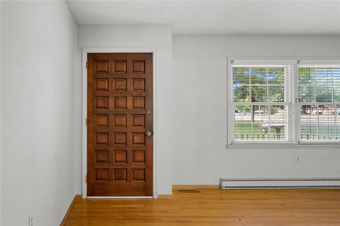 2101 Old Spring Drive Anderson, SC 29625 - Photo 2 of 36 Enter into a bright space with polished hardwood floors and ample natural light.