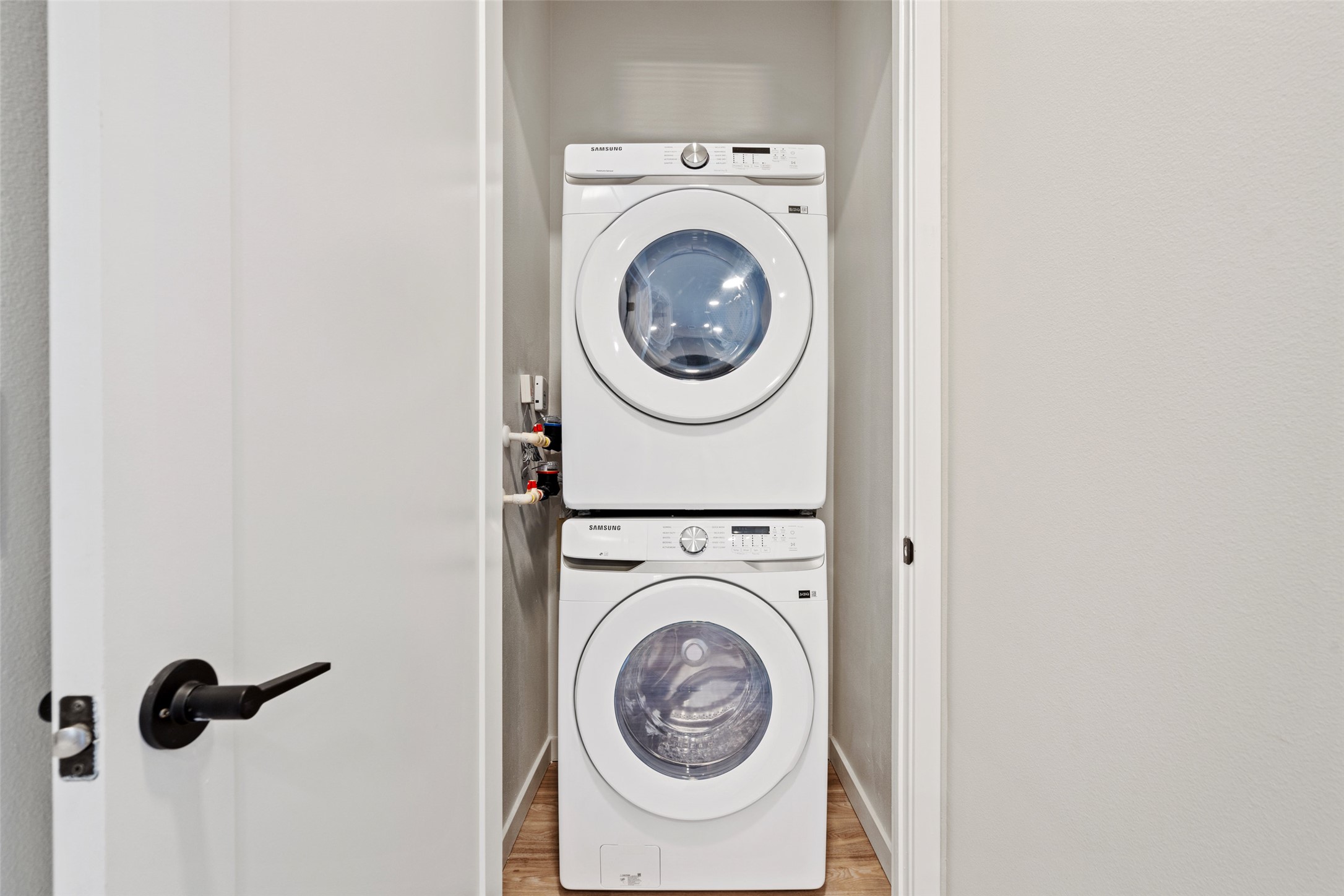 4510 Terry-O Lane, Unit 341 Austin, TX 78745 - Photo 35 of 40 Dedicated laundry area featuring a stacked washer and dryer unit