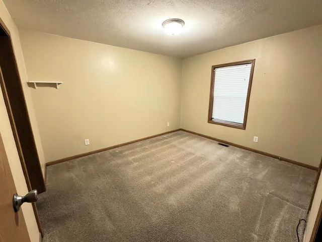 an empty room with a door