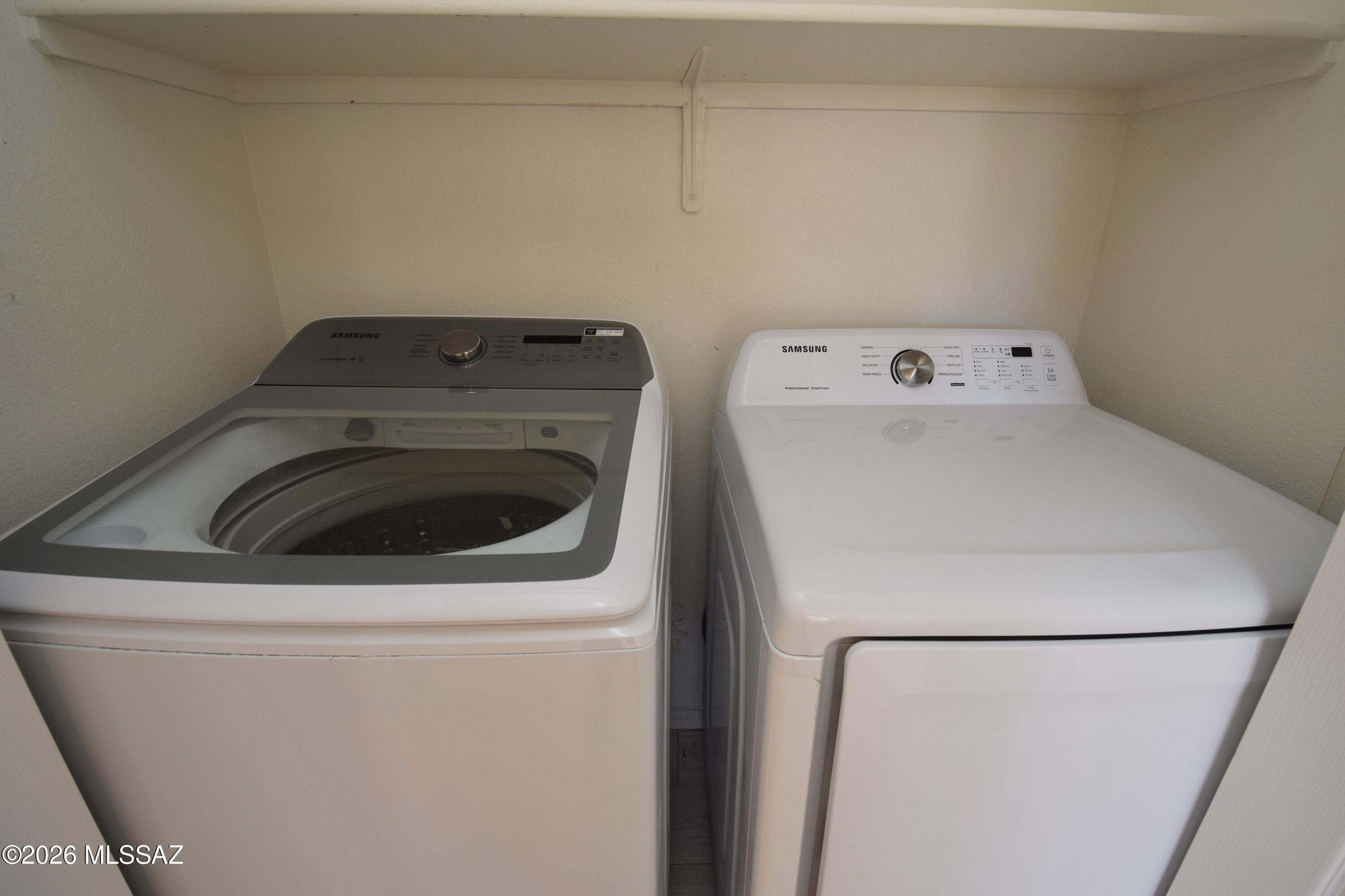 5855 North Kolb Road, Unit 11106 Tucson, AZ 85750 - Photo 32 of 36 a utility room with dryer and washer