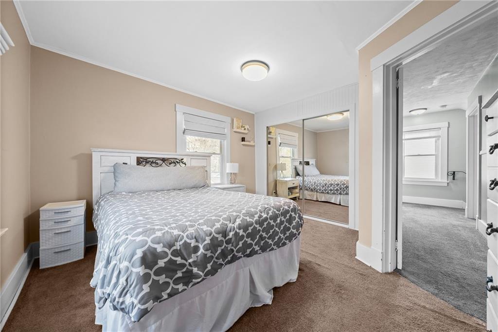 180 Hinkel Road Pittsburgh, PA 15229 - Photo 22 of 45 a bedroom with a bed and a view of bathroom