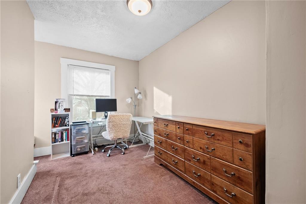 180 Hinkel Road Pittsburgh, PA 15229 - Photo 25 of 45 a view of a workspace with furniture and a window