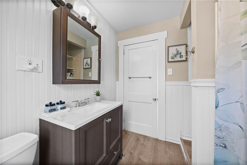 180 Hinkel Road Pittsburgh, PA 15229 - Photo 28 of 45 a bathroom with a sink vanity and a mirror