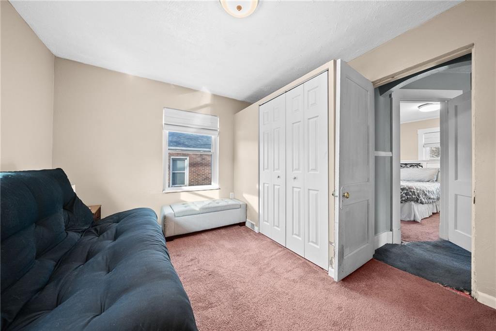 180 Hinkel Road Pittsburgh, PA 15229 - Photo 29 of 45 a living room with furniture and a window