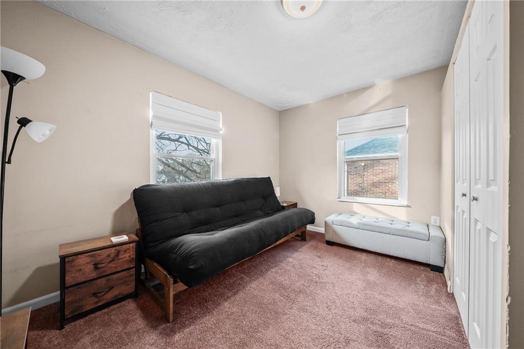 180 Hinkel Road Pittsburgh, PA 15229 - Photo 30 of 45 a living room with furniture and a window