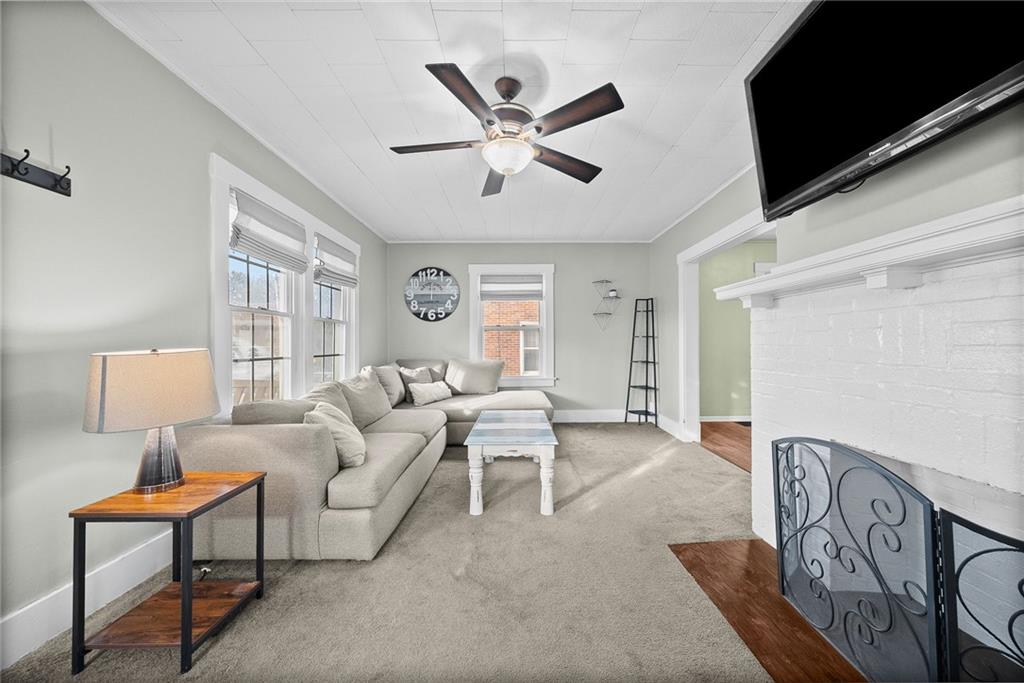 180 Hinkel Road Pittsburgh, PA 15229 - Photo 9 of 45 a living room with furniture and a window