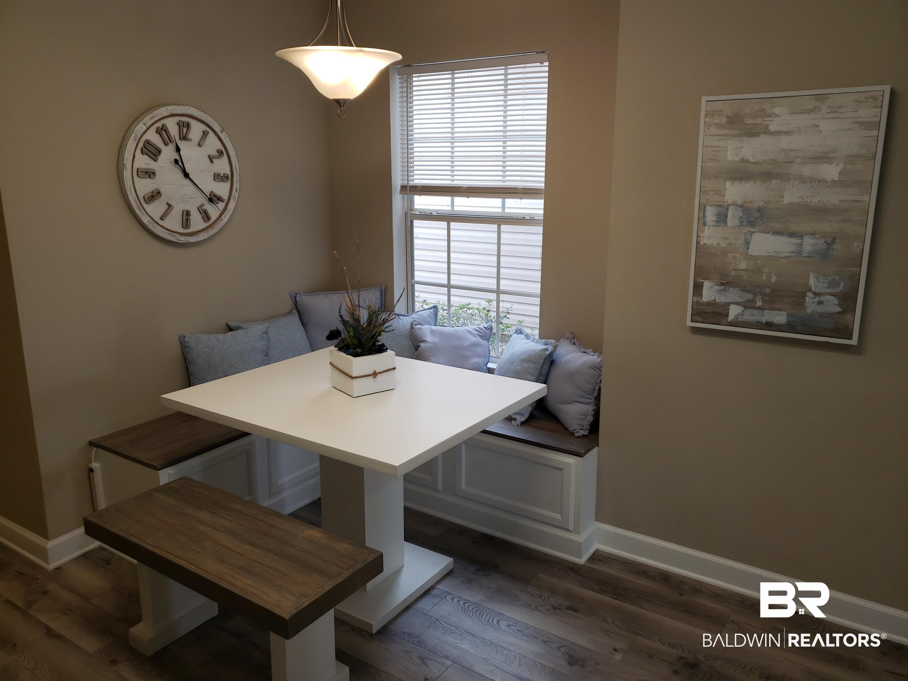 2006 Shelene Way, Unit 2006 Foley, AL 36535 - Photo 4 of 29 Dining room with dark wood-style floors, baseboards, and breakfast area