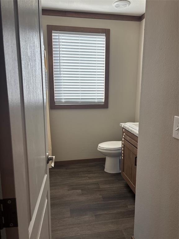 480 Cordell Road Sadler, TX 76264 - Photo 16 of 25 a bathroom with a toilet and a window