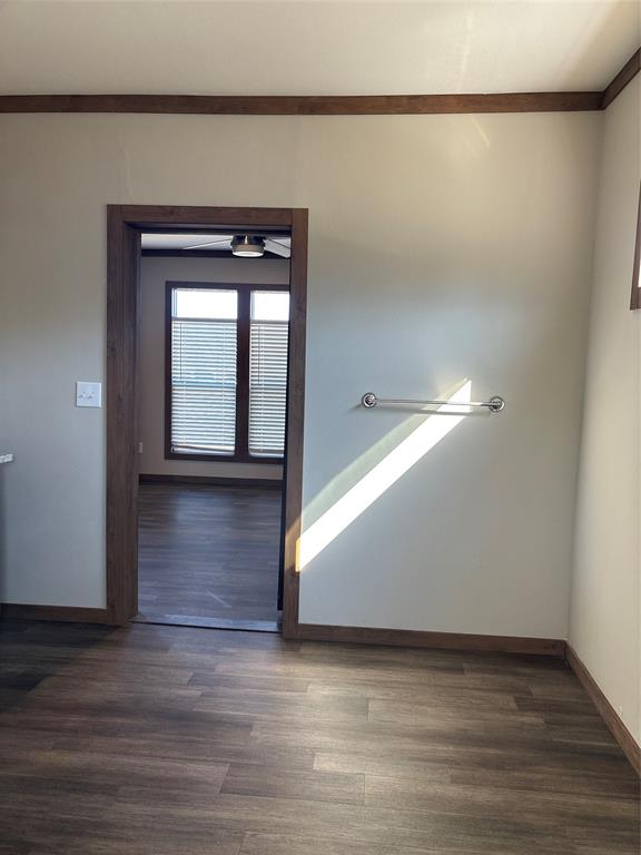 480 Cordell Road Sadler, TX 76264 - Photo 19 of 25 a view of empty room with wooden floor and fan