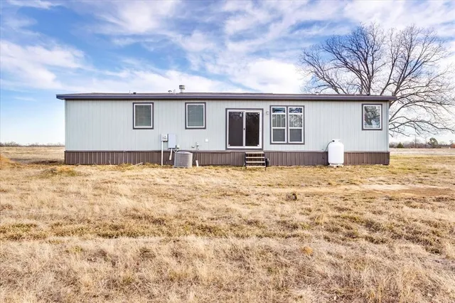 a front view of house with yard