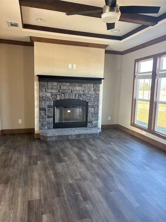 480 Cordell Road Sadler, TX 76264 - Photo 10 of 25 a view of an empty room with wooden floor fireplace and a window