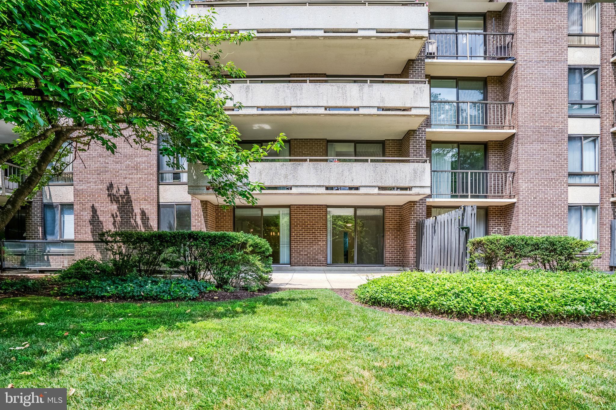 1800 Old Meadow Road, Unit 218 McLean, VA 22102 - Photo 25 of 57 A lush green view from the patio